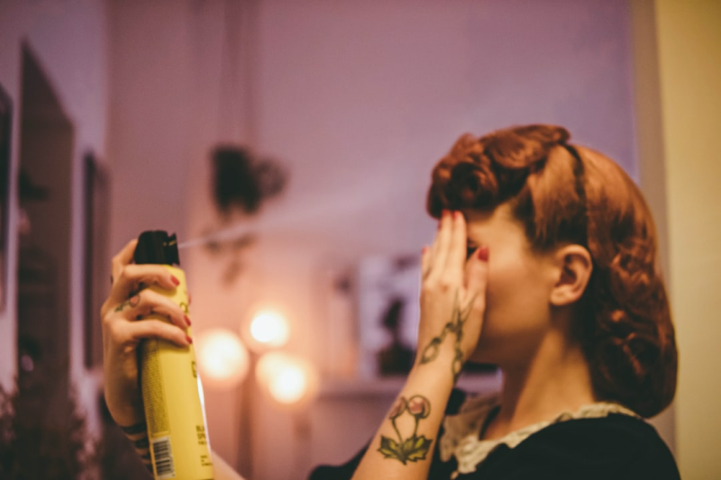 Using hairspray is permitted for styling hair in passport photos, as long as the hairstyle resembles your everyday look.